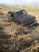 1995 Ford Bronco - always check how deep the mudd hole is first.