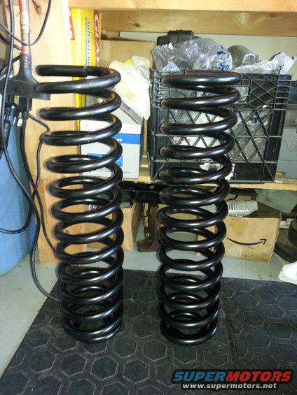 20140510_092204.jpg custom Deaver coil springs with a TTB style pig tail mount on the bottom. These are 22 inches uncompressed and come in at a spring rate of 260 lbs. should improve the ride over the 400 lb springs I had in there before.