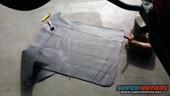 Sound deadening material and roller on concrete floor