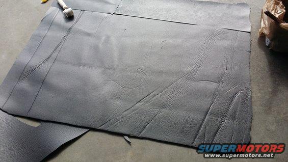 Sound deadening material cut with a roller tool on a concrete floor
