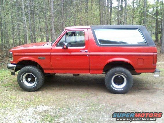 1992 Ford Bronco, red, side view, parked outdoors