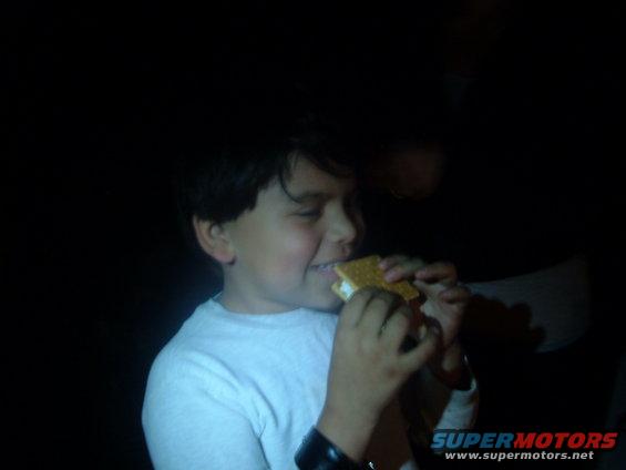 kid eating a s'more
