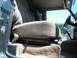 Just like the driver's, this chair slides fore-aft (black lever in front), and reclines (chrome leve...