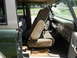 Just like the driver's, this chair slides fore-aft (black lever in front), and reclines (chrome leve...