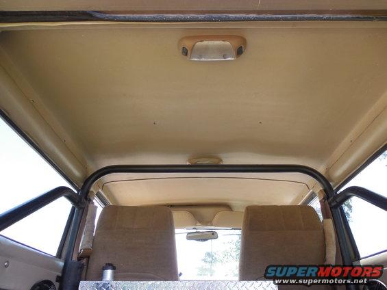 roof13.jpg There are 3 dome lamps.  The stock one in the wiper motor cover, and these 2 later ones with map lamps.  Then there's another cargo lamp out-of-frame in the Left bedwall panel near the tailgate which switches between On and Auto (linked to the door courtesy lamp switches).