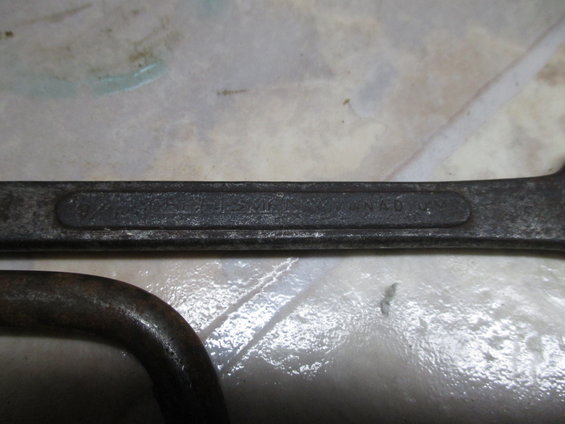 Close-up of a wrench with text "CRAFTSMAN CANADA"