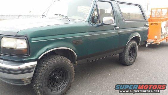 black out bronco emblem cleaned up now.
painted trim on bottom ugly tan gone.