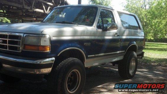1996 Ford Bronco 3q front view, two-tone blue and silver