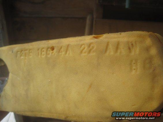Yellow foam part with stamped numbers: F2TB 1863 4A 22 AA W 80