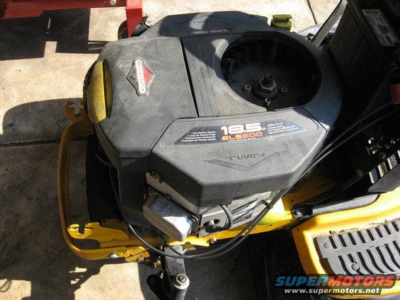Briggs & Stratton 18.5 HP twin engine with yellow frame and black cover. Visible text includes '18.5', 'GL500', and 'TWIN'