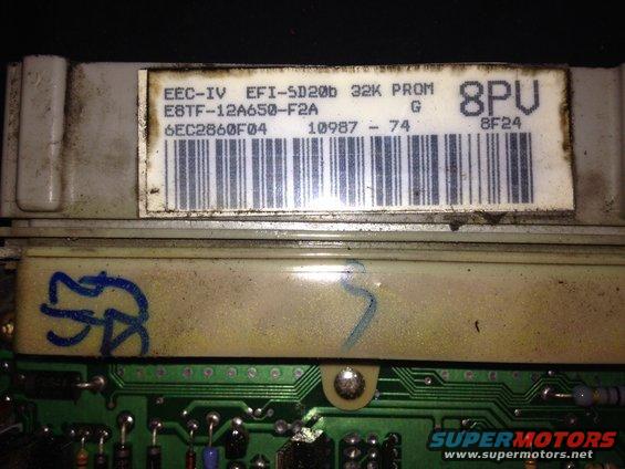 Close-up of an EEC-IV EFI-SD20b 32K PROM computer module with part number E8TF-12A650-F2A and code 8PU