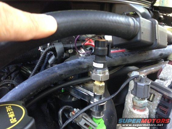 Engine sensor with SAE 5W-20 oil cap visible