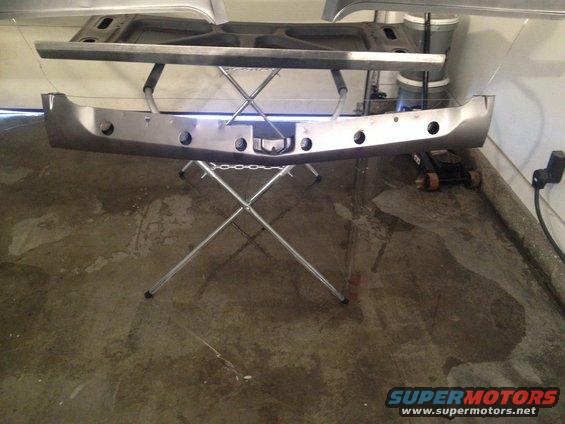 1965 Ford Mustang front bumper and hood support on stand