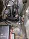 1988 Ford Bronco - Close-up of complex wiring and electrical components in a vehicle's engine bay.