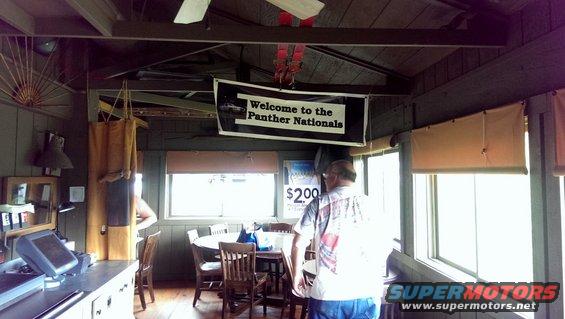 Interior scene with "Welcome to the Panther Nationals" banner
