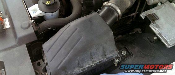Engine bay air intake housing and ECU