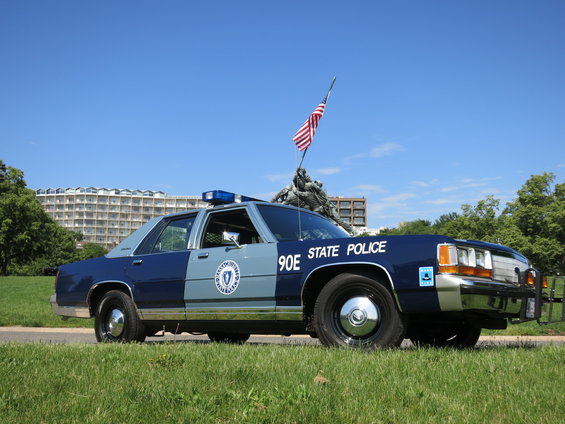 1991 Ford Crown Victoria police car, side view, blue and grey
