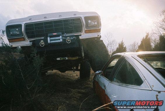 Big Ford truck is about to crush a small car