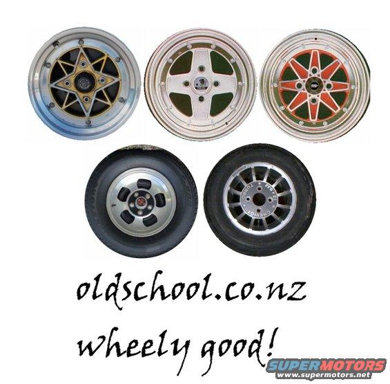 Five car wheels, three without tires, two with tires, on a white background