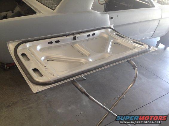 photo-4.jpg 1965 Mustang trunk lid weatherstrip tape removed