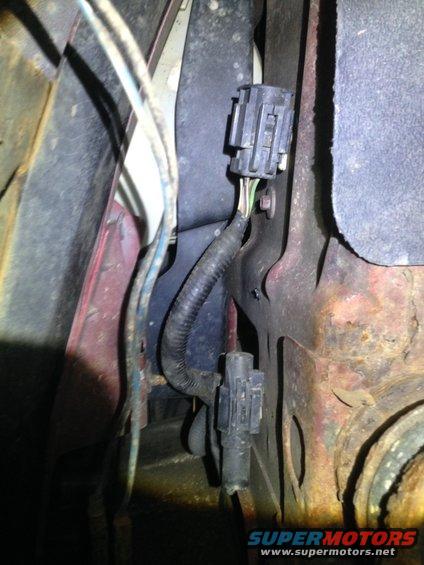 Noticed this harness today and wondered what it's for. It's capped and has multiple wires. It s located below the Driver's side head light. It is right next to my temp sensor for the overhead console.