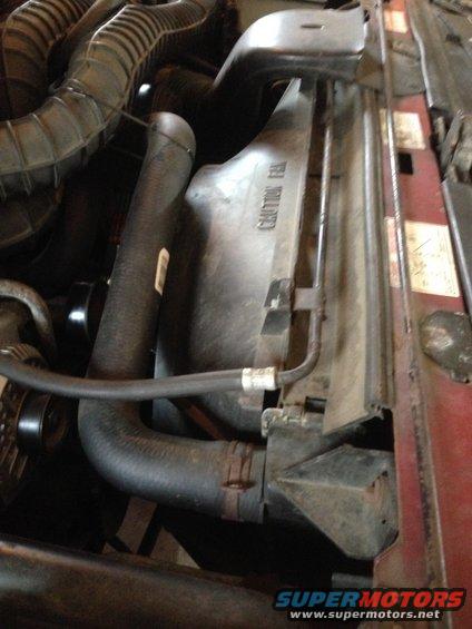 I am going to be replacing all of my radiator hoses soon. I was wondering what this top hose is called. It part rubber but mostly steel line that runs the length of the radiator.