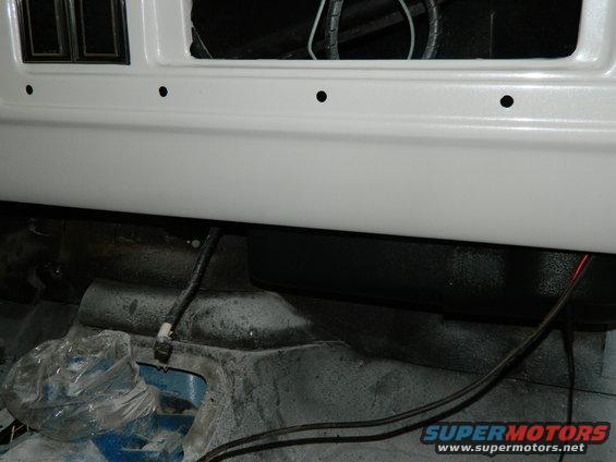 Close-up of wiring and under-dash area of a vehicle