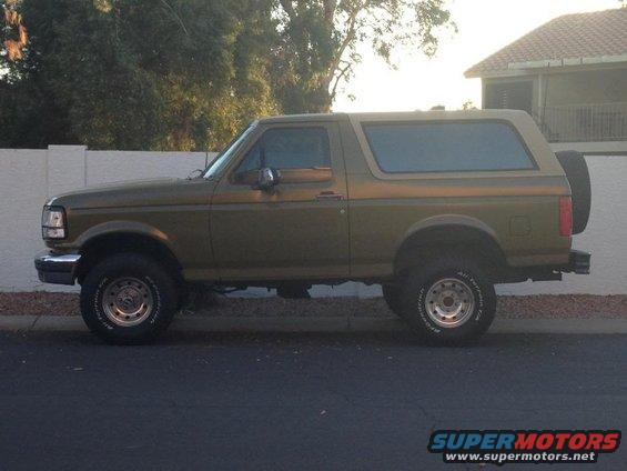 Side view of a 1994 Ford Bronco parked on a street