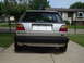 1985 Volkswagen GTI - Rear view of a silver 1985 Volkswagen GTI parked in a driveway.
