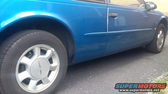 Blue 1994 Ford Thunderbird coupe side view