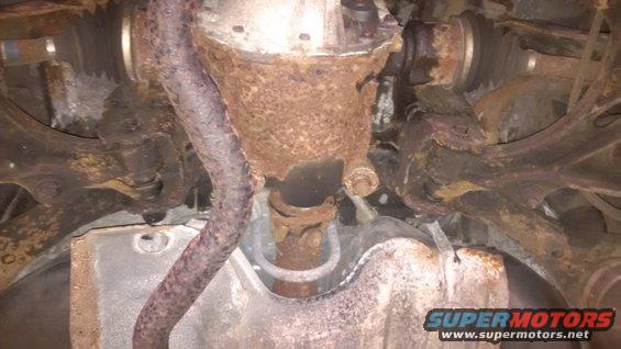rusted driveshaft, differential housing, and suspension parts