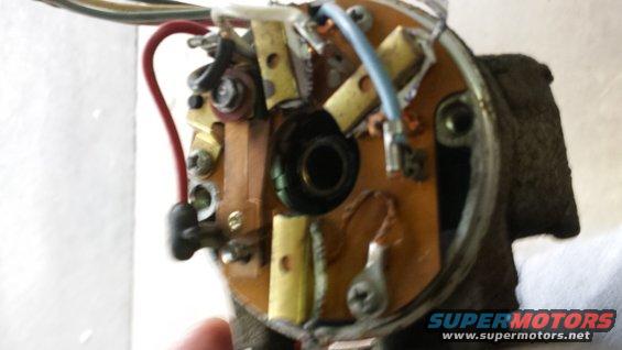 Close-up of a complex electrical component with wires and circuit board