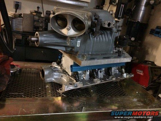 Supercharger assembly with dual throttle bodies and intake manifold