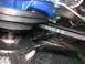 1968 Mercury Cougar - Close-up view of engine belts and fan assembly, with a blue painted component visible.