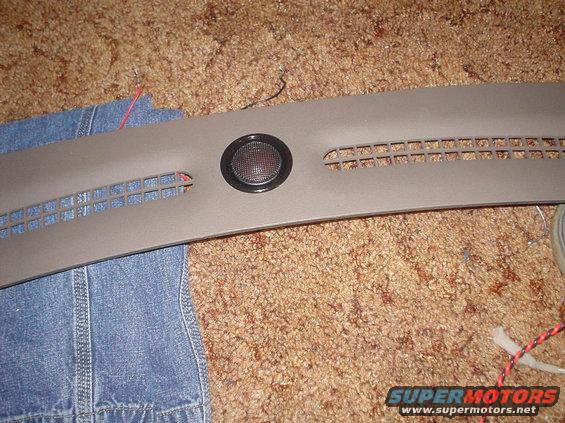 dsc00811.jpg Here is the custom mounted center speaker. This is the front defrost vent pannel. It is a polk momo tweeter run of a dedicated center channel amp with audio from both fron right and left mixed together untill I can afford a dolby decoder.