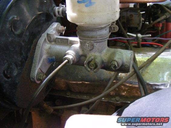 Brake master cylinder with reservoir and brake lines attached