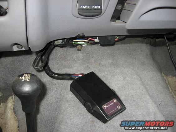Trailer brake controller and 4x4 shifter in a vehicle interior