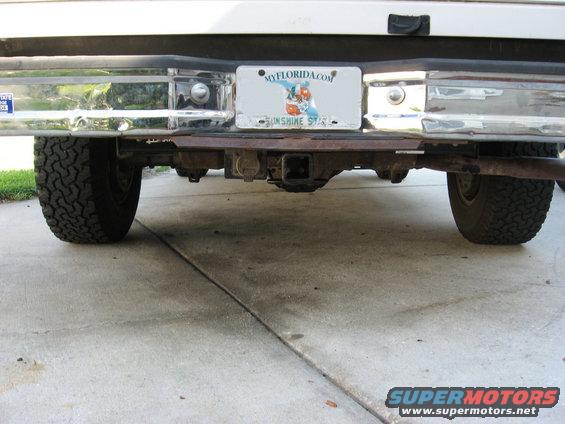 1994 Ford Bronco rear bumper, hitch, and tires. Florida license plate visible