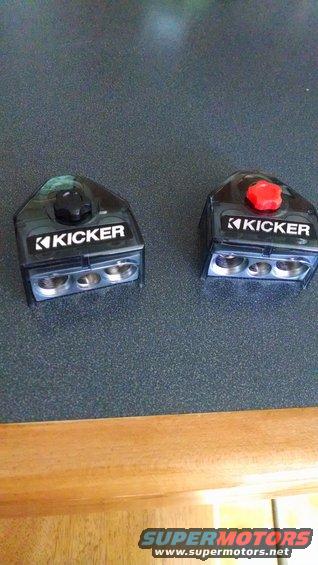 Two black Kicker power distribution blocks with visible terminals