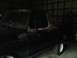 1978 Ford Bronco - This 1978 Ford Bronco is seen in a garage with visible rust on its side door.