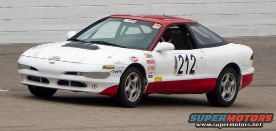 1993 Ford Probe race car with number 212 on the side, white with red accents
