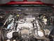 2004 Ford Crown Victoria - The engine compartment of a 2004 Ford Crown Victoria is shown with its V8 engine and associated parts.