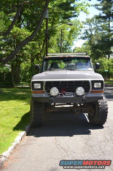 Lifted 1978 Ford Bronco front view with aftermarket bumper and lights
