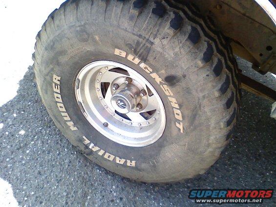 Mudder Buckshot radial tire on a silver rim