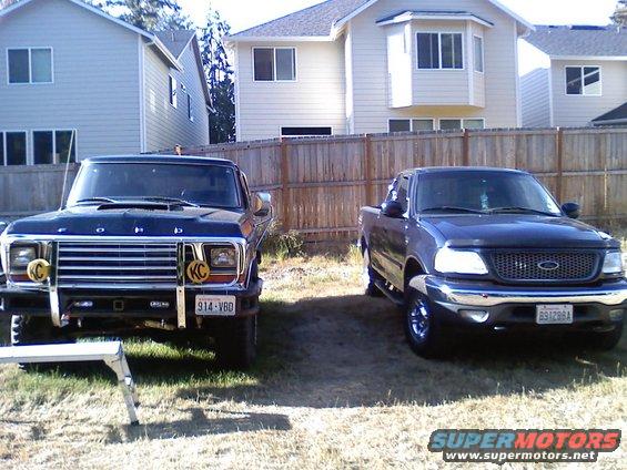 Dark blue 1979 Ford F-Series truck front view with KC lights and license plate 914-VBD