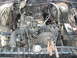 1979 Ford Bronco - Engine bay detail showing V8 engine components and radiator.