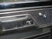 1979 Ford Bronco - Close-up of a vehicle's interior door panel, showing the window crank and door handle.