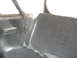 1979 Ford Bronco - Interior view of a vehicle, focusing on the seat and a roll bar.