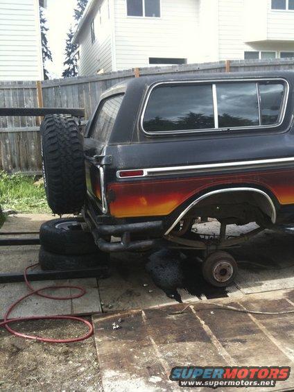 Rear view of a 1979 Ford Bronco with a spare tire and custom bumper