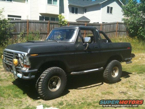 Black 1978 Ford Bronco with off-road tires and bumper